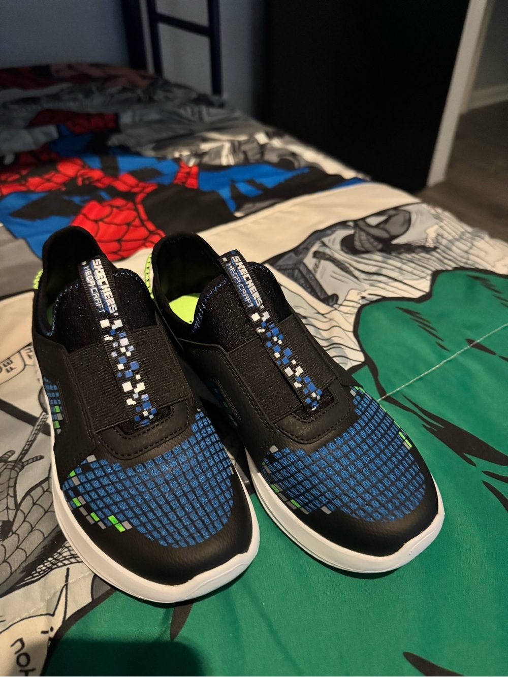 Skechers Kids Black & Blue Slip-On Sneakers with Neon Green Accents